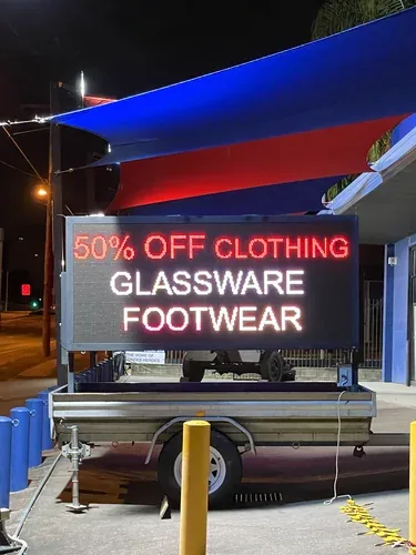Double sided LED sign hire — corner site deployment