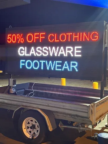 Double sided LED sign hire — outdoor event