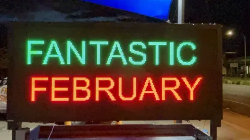 Double sided LED sign hire — retail precinct