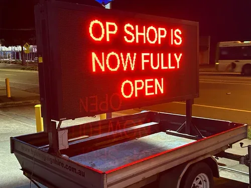 Double sided LED sign hire — daytime deployment