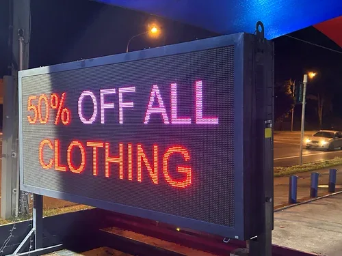 Double sided LED sign hire — night display