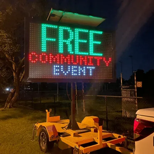Five colour VMS sign hire — free community event night