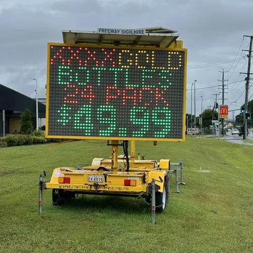 Five colour VMS sign hire — retail promotion overcast day